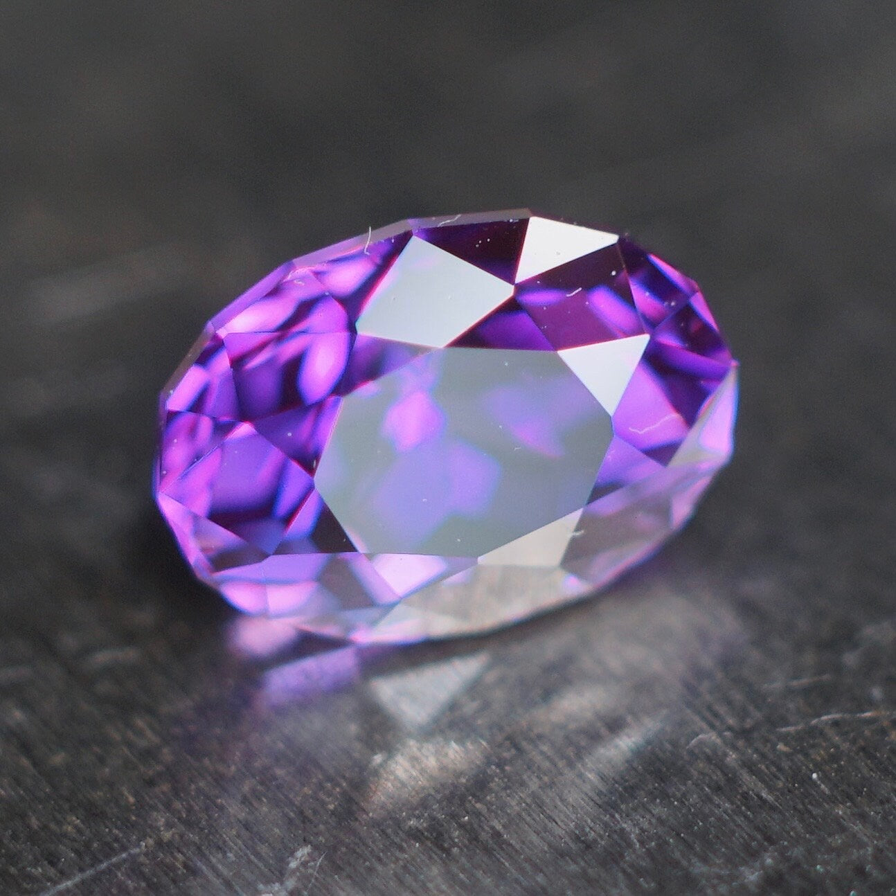 MADE TO ORDER. ~3 ct royal purple plum flame fusion sapphire