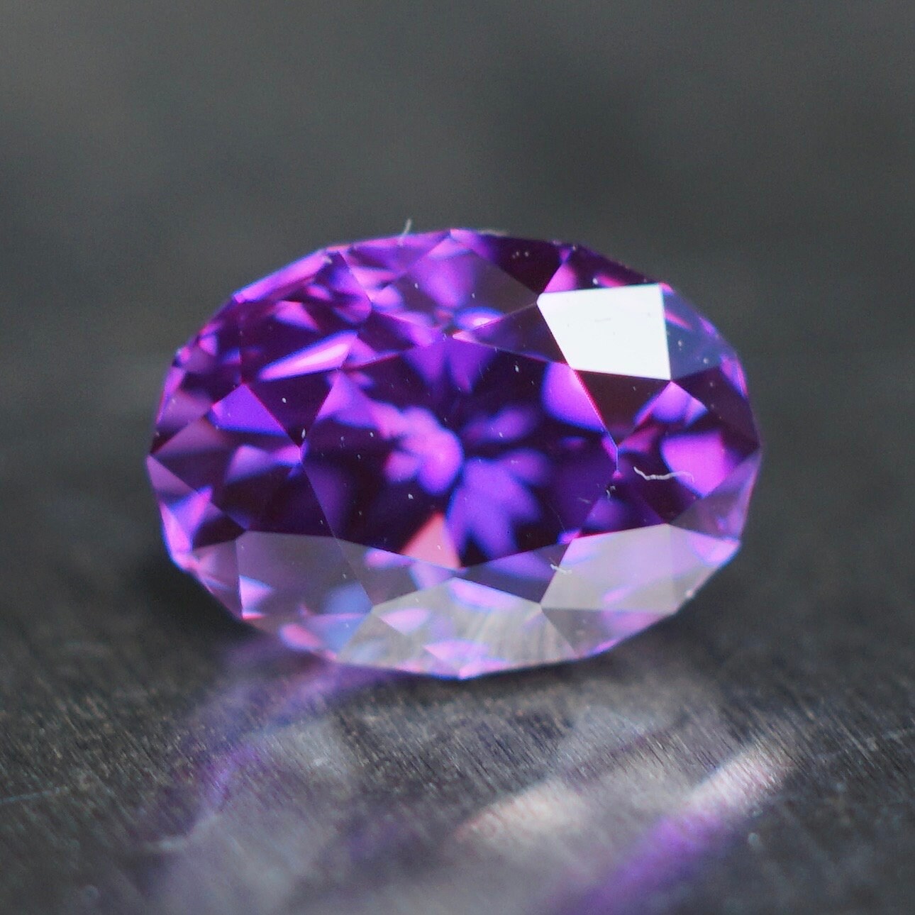 3.03 ct royal purple plum flame fusion sapphire