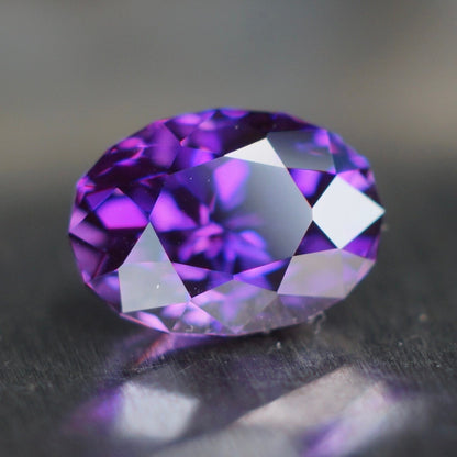 3.03 ct royal purple plum flame fusion sapphire