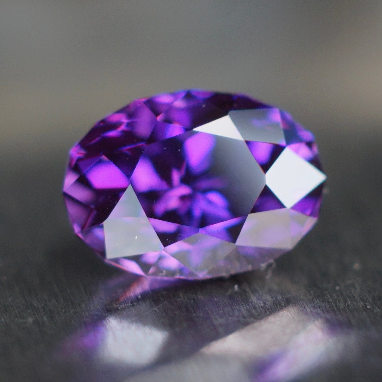 3.03 ct royal purple plum flame fusion sapphire