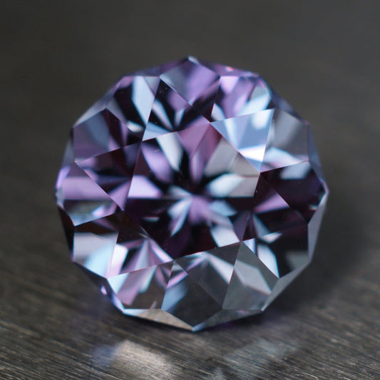 MADE TO ORDER purple to steely blue lab sapphire.