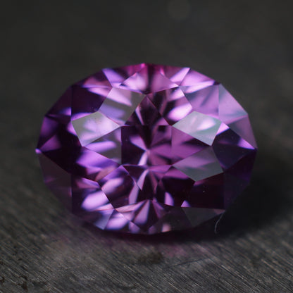 3.07 ct purple plum flame fusion sapphire