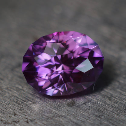 3.07 ct purple plum flame fusion sapphire